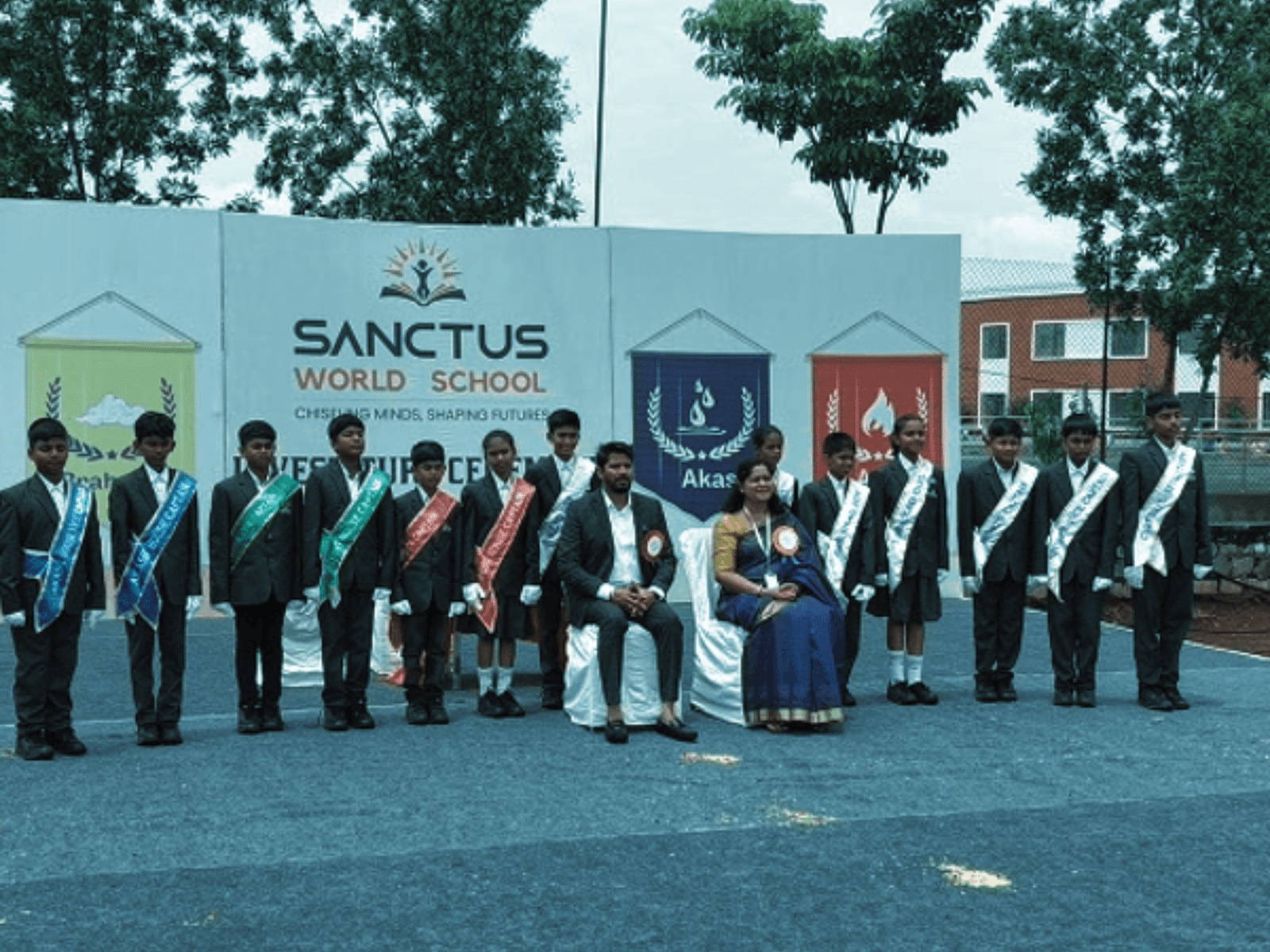 Investiture ceremony at Sanctus World School - premier educational institution in BN Reddy Nagar celebrating student leadership